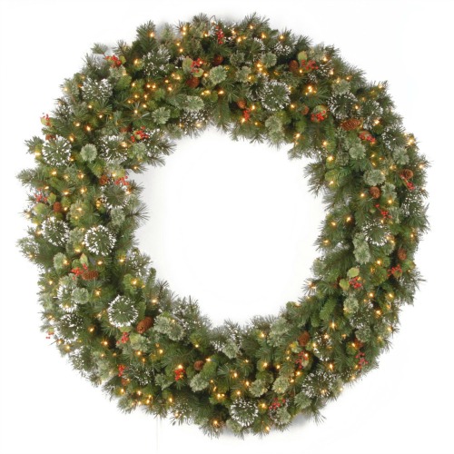 large christmas wreath with lights and pine cones